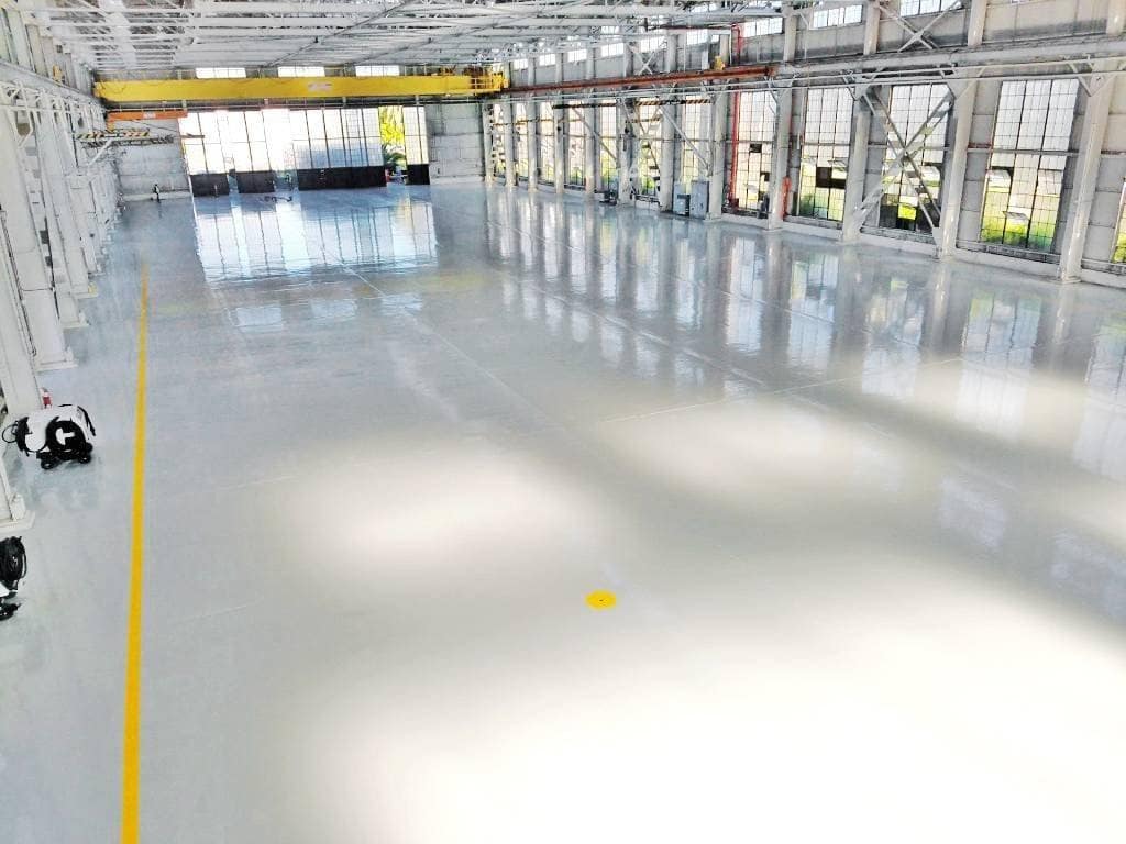 Warehouse epoxy Flooring 2 Spacious Melbourne warehouse featuring seamless epoxy flooring